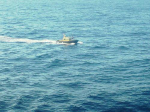 Pilot boat approaches The Radiance
